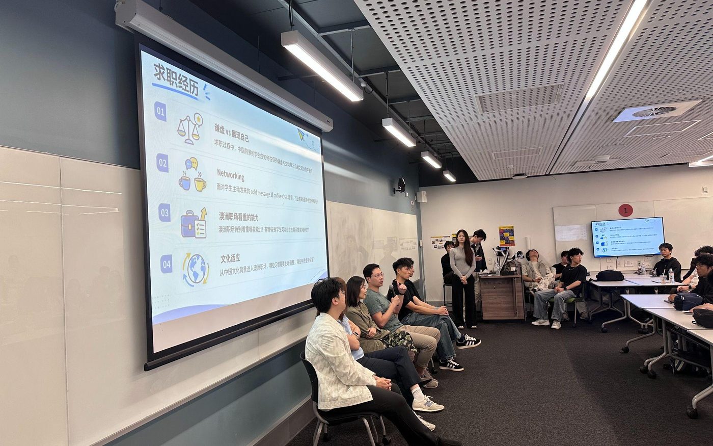 Guest speakers sharing their career experience with students at an AWS UNSW session